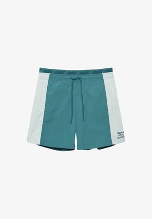 Short de bain sarcelle avec panneaux latéraux blancs, taille réglable à cordon et petit graphisme sur la partie inférieure de la jambe gauche.