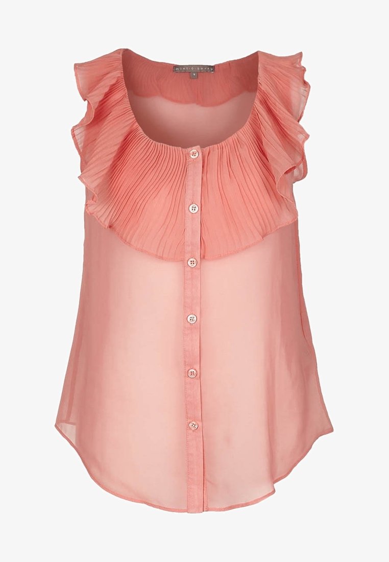 Blouse rose sans manches avec col plissé volanté et fermeture boutonnée devant, en tissu léger transparent.
