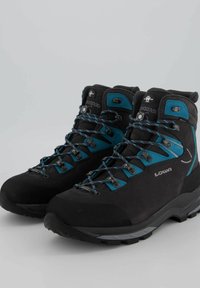 Halfhoge wandelschoenen in zwart en teal met vetersysteem, gevoerde kraag en duurzame rubberen zolen voor verbeterde grip.