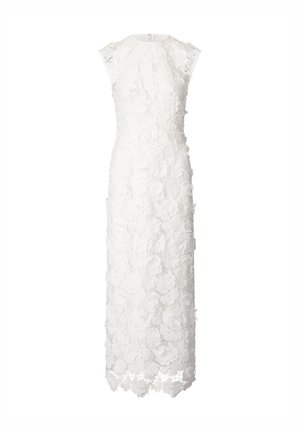 Witte mouwloze jurk met bloemenoverlays, knielang, complexe textuur, hoge hals en scalloped zoomdetails.