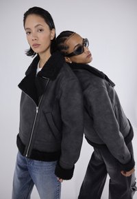 YOURTURN UNISEX Winter jacket black