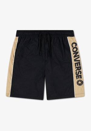 Μαύρο μαγιό με ελαστική μέση, μπεζ πλαϊνές πινελιές και μεγάλο μαύρο κείμενο "CONVERSE". Το υλικό είναι ελαφρύ και λείο.