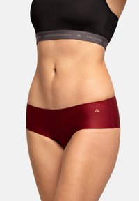 Mutande hipster seamless color bordeaux con tessuto morbido. Presenta un design a vita bassa e un logo discreto sulla cintura.