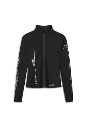 Veste zippée noire avec col montant, ornée de motifs abstraits blancs sur les manches et d'un logo au niveau de l'ourlet, fabriquée en matériau lisse.