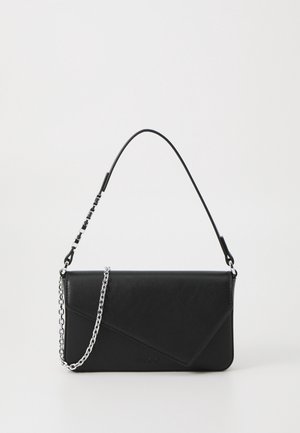 Black leather clutch with a diagonal design, silver chain strap, and smooth texture. Notable logo and minimalist shape.