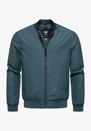 Bomber bunda v tmavom tyrkysovom odtieni, vyrobená z hladkého materiálu. Obsahuje zips, stojací golier a rebrované manžety, ako aj bočné vrecká.