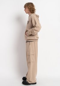 Reporter - Bluza z kapturem