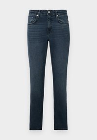 Tamsiai mėlynos slim-fit džinsai su priekinėmis kišenėmis, mygtuku ir diržo kilputėmis, pateikti prieš šviesų paprastą foną.