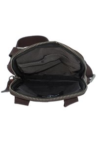 Borsa in tessuto marrone con apertura a zip. L'interno presenta diversi scomparti con una superficie liscia. Design minimalista, senza hardware visibile.