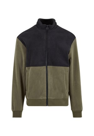 Giacca in pile con colletto alto, parte superiore nera e pannello inferiore verde oliva. Include zip frontale e tasche laterali.