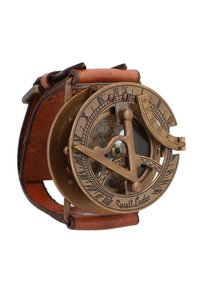 Brass compass wristwatch with a brown leather strap, featuring a dial with numeric markings, a glass lens, and a decorative engraving.