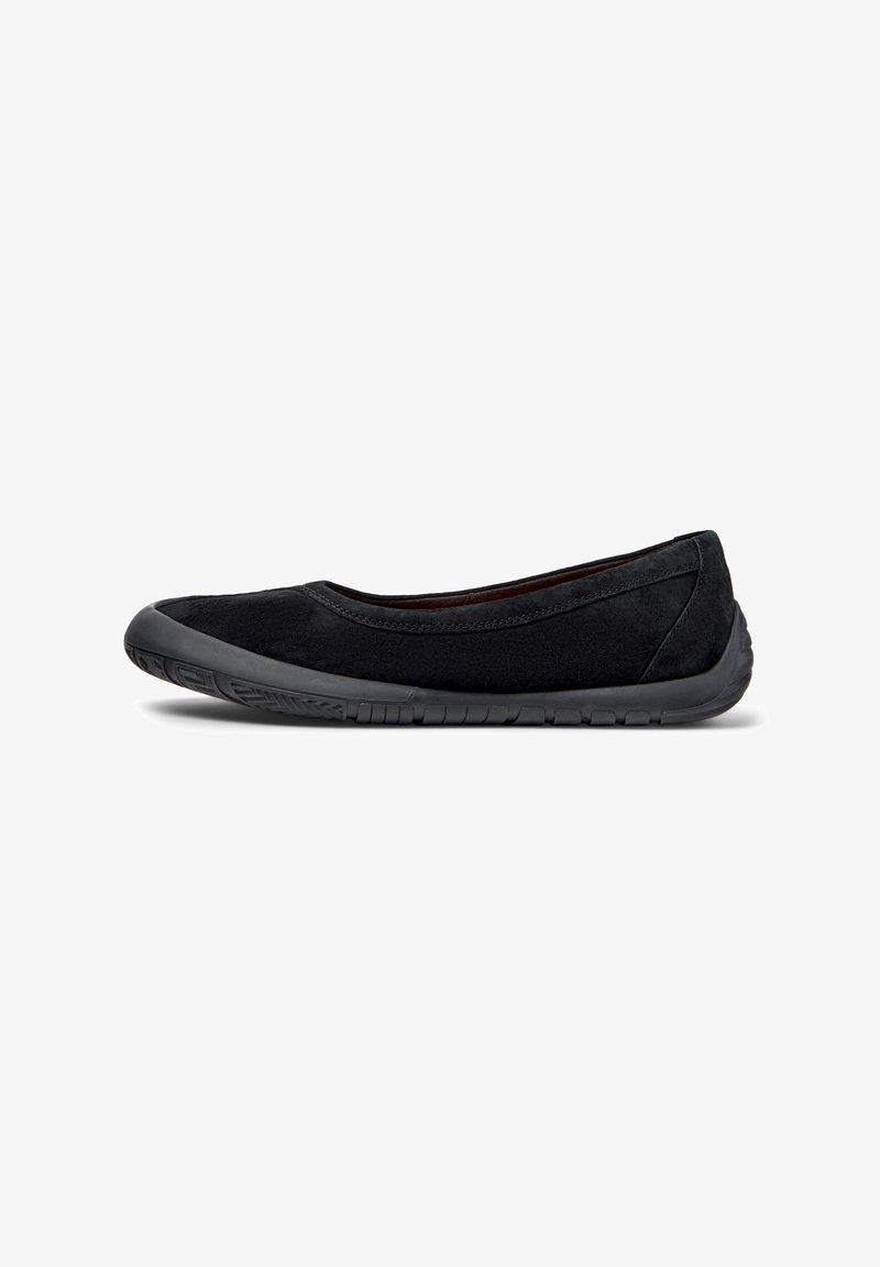 Black flat shoes made of soft suede with a rounded toe, rubber sole, and minimal stitching details. Lightweight and flexible design.