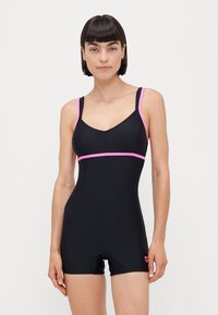 Maillot de bain noir avec des accents roses. Doté de bretelles ajustables, d'un design ajusté et d'une coupe au niveau des hanches. Texture lisse, style minimaliste.