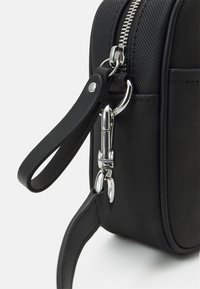 Lacoste Borsa a tracolla - black
