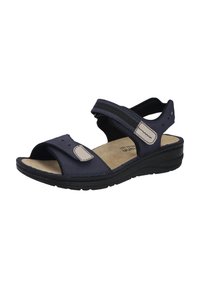 Marineblaue Sandale mit weichem Wildledersohle, verstellbaren Klettverschlussriemen, niedrigem Keilabsatz und kontrastierenden hellgrauen Akzenten.