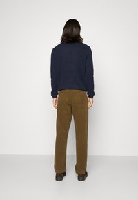 Lindbergh Tygbyxor - sand