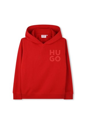 Sweatshirt à capuche rouge avec "HUGO" en relief sur le coin supérieur gauche de la poitrine, poignets et ourlet côtelés, et une étiquette à l'intérieur de l'encolure.