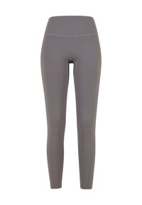 Leggings gris en tissu extensible, dotés d'une taille haute et d'une finition lisse. Ils sont ajustés sans coutures visibles.