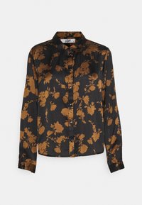 Camicia nera con maniche lunghe, abbottonatura frontale e colletto; presenta un motivo floreale in bronzo. Realizzata in materiale simile al satin.