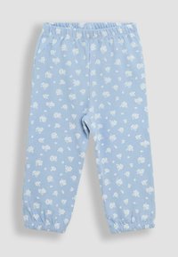 Heledad sinised dressipüksid pehmest kangast, millel on valge lillemuster, elastne vöökoht ja gathered cuffs pahkluude juures.