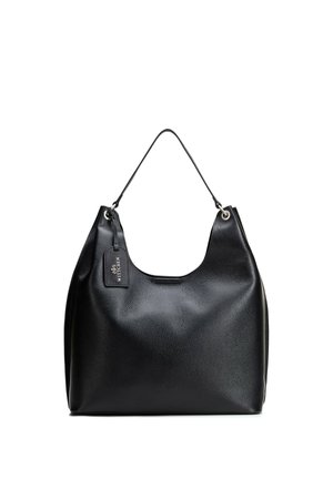 Bolso de cuero negro con un único asa superior, cuerpo ligeramente caído y una pequeña etiqueta con la inscripción "WITTCHEN" adherida cerca del asa.