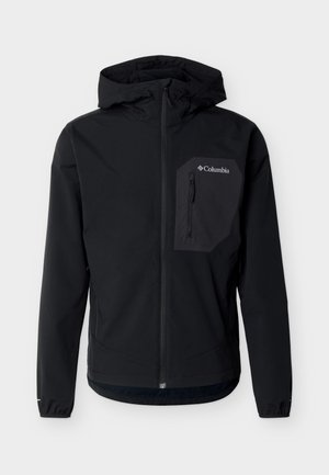 Μαύρο μαλακό τζάκετ Columbia με κουκούλα, εμπρόσθιο φερμουάρ και τσέπη στο στήθος με φερμουάρ στην αριστερή πλευρά.