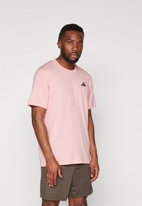 adidas Performance TR-ES FR T - Camiseta deportiva - semi pink spark/black