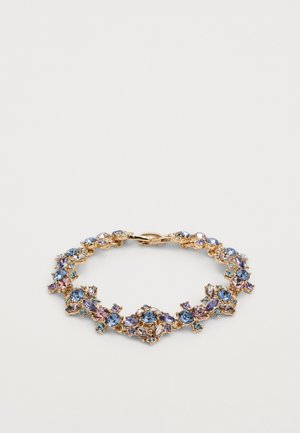 Gold bracelet adorned with purple, blue, and aqua stones in various shapes, featuring a decorative clasp and intricate floral patterns.