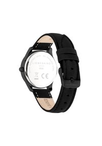 Orologio in acciaio inox nero con un cinturino in pelle nera liscia, caratterizzato da una cassa tondeggiante, un retro trasparente e una chiusura a fibbia regolabile.