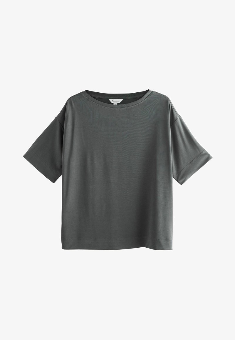 Pelēka īsām piedurknēm t-krekla ar brīvu piegriezumu, apaļu kakla izgriezumu un gludu tekstūru. Iezīme vienkāršs dizains bez rakstiem vai akcentiem.