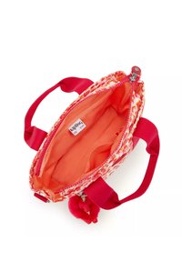 Borsa con motivo rosso e arancione, chiusura con zip, due manici corti e un charm pom-pom fluffy rosa all'interno; foderata con tessuto arancione brillante.