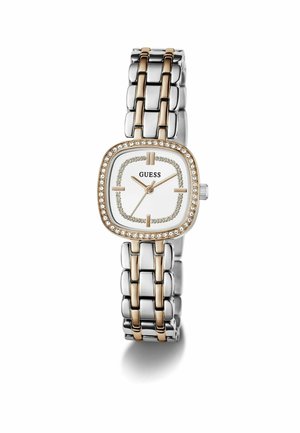 Silver and gold-tone watch with a square face, white dial, and crystal embellishments. Metal link bracelet design with alternating colors.