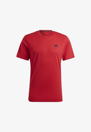 T-shirt de sport rouge à manches courtes avec col rond et petit logo Adidas noir sur le côté gauche de la poitrine.