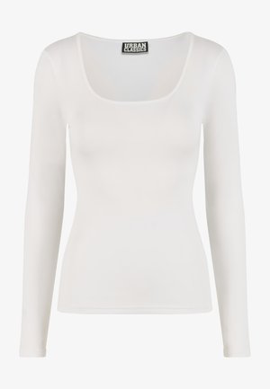 Hvid langærmet top med firkantet halsudskæring, lavet af glat, elastisk stof. Har minimal syning og en label med teksten "URBAN CLASSICS."