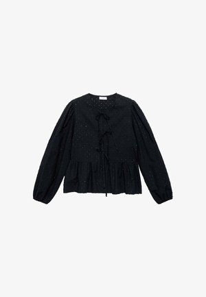 Črna bluzica z dolgimi rokavi, teksturirana tkanina, nabran rob in zavezan detajl pri ovratniku. Ima majhne, enakomerno razporejene svetle akcentne točke.