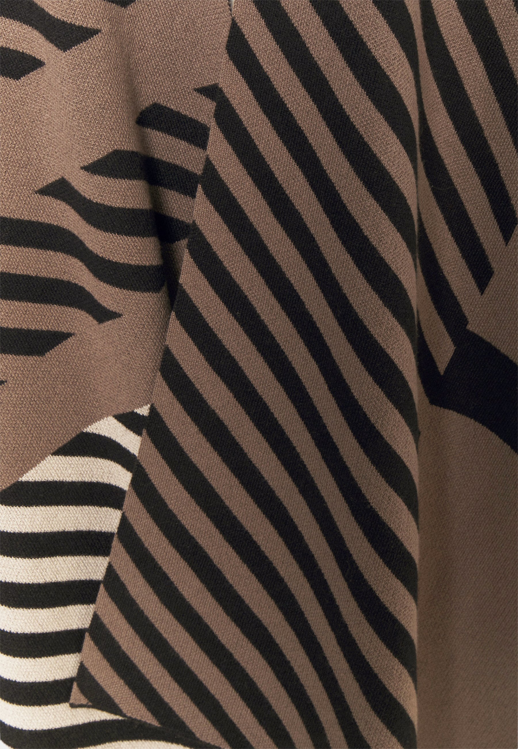 black vans leopard print stripe