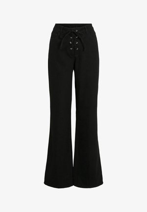 Černé zvonové kalhoty z bavlny, s šněrováním vpředu se stříbrnými očky a klasickým pasem. Hladká struktura a přizpůsobený střih.