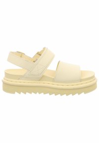 Beige plattform sandal med tykk såle, to brede stropper og en justerbar bakstropp med borrelås.