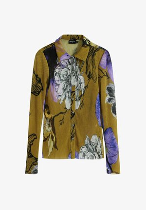 Chemise à manches longues en velours côtelé jaune moutarde avec un grand motif floral en noir, blanc et violet ; dotée d'un col et d'une fermeture à boutons sur le devant.