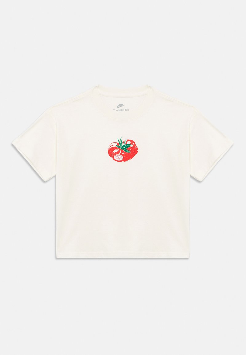 T-shirt crème coupé en coton, avec un graphique de tomate rouge avec des feuilles vertes et un texte, col rond et manches courtes.