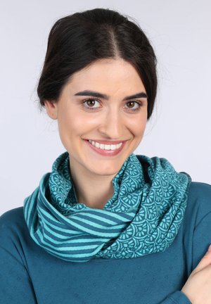 Teal infinity scarf featuring a striped pattern on one side and a floral design on the other. Soft texture, lightweight fabric.