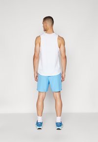Nike Performance CHALLENGER SHORT - Sports shorts - university blue/black/reflective silver