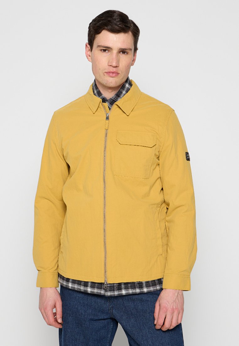 Barbour International Lichte jas geel