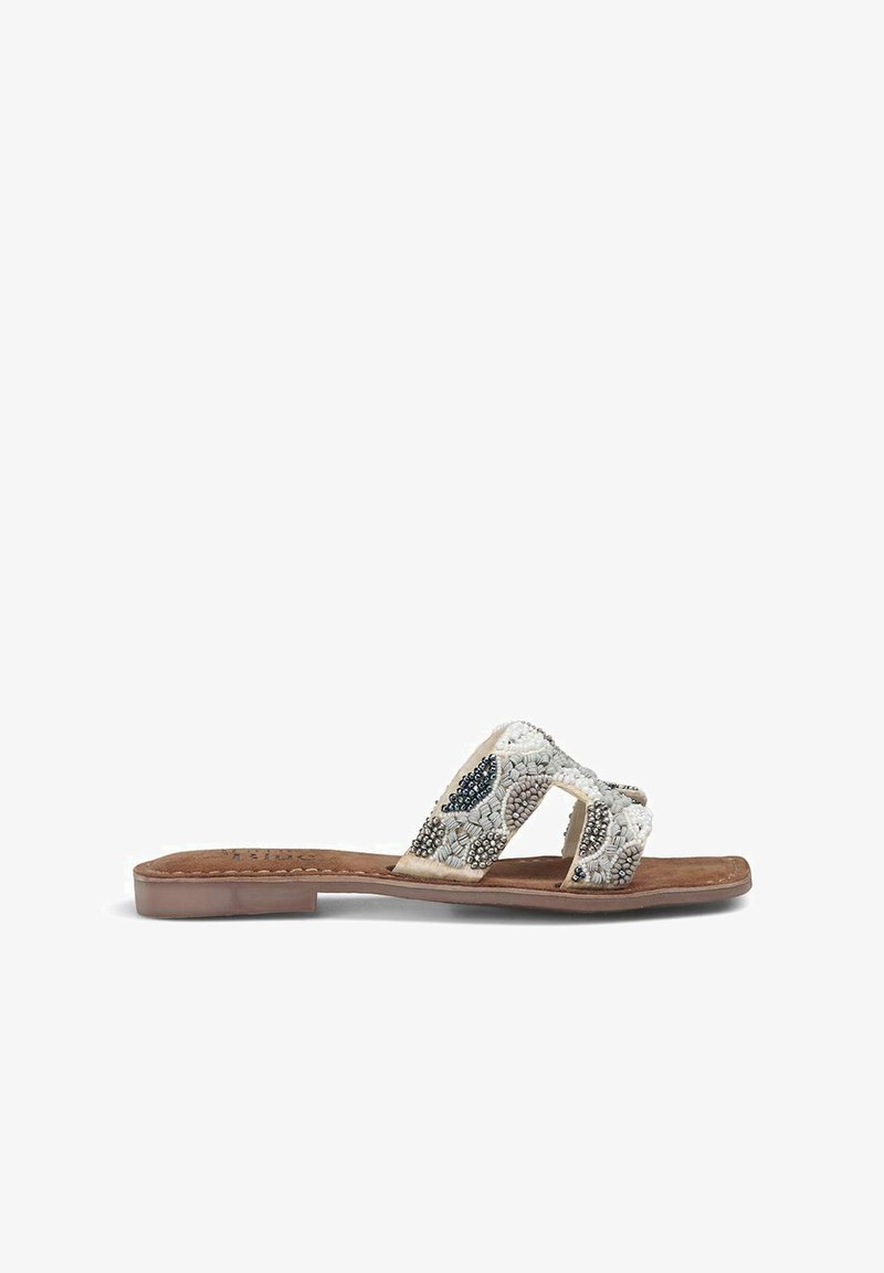 Beaded flat sandals featuring a beige leather base and a braided design with silver and blue accents, open-toe style, with a flexible sole.