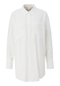 White long-sleeve button-up shirt made of soft fabric. Features a classic collar, two front pockets, and a relaxed fit.