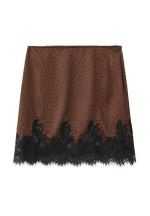 Smeđa mini suknja s crnim točkicama i crnom čipkom na rubu, s patentnim zatvaračem straga.