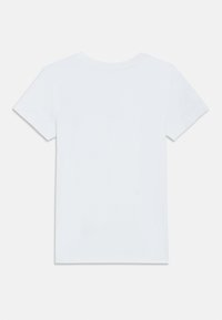 Λευκό μπλουζάκι κοντό μανίκι από βαμβάκι. Απλός σχεδιασμός με στρογγυλή λαιμόκοψη και ίσια γραμμή. Χωρίς ορατά σχέδια ή διακοσμήσεις.