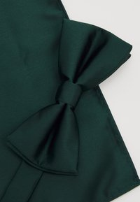 Green satin fabric with a large, structured bow detail. The fabric has a smooth texture and features subtle sheen. Edge is neatly finished.