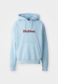 Light blue hoodie made of soft fabric, featuring a front pocket and drawstring hood. "Dickies" logo in dark red across the chest.