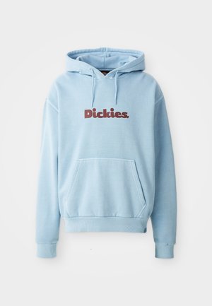 Light blue hoodie made of soft fabric, featuring a front pocket and drawstring hood. "Dickies" logo in dark red across the chest.
